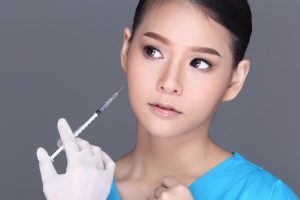 woman receiving kybella injection
