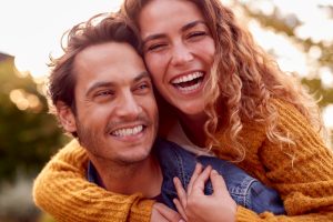 young couple smiling and laughing